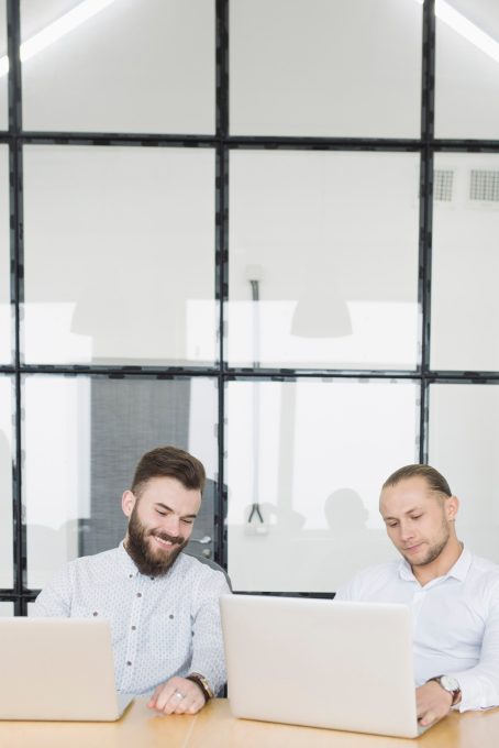 business-people-working-with-laptop-office_23-2148017150