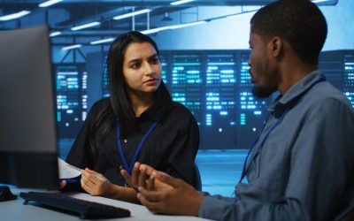 coworkers-data-center-looking-annual-systems-review-documents_482257-89691