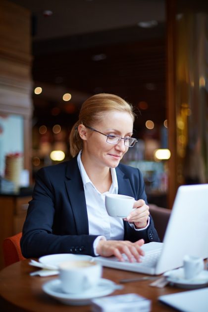 female-executive-working-coffee-shop_1098-2244