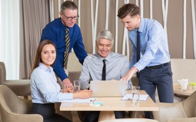 five-smiling-business-people-working-cafe_1262-1828