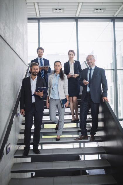 group-confident-businesspeople-office_107420-84863