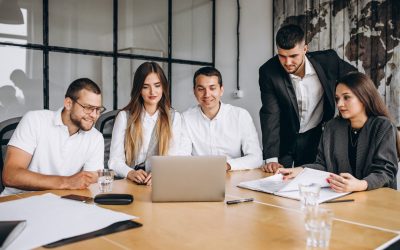 group-people-working-out-business-plan-office_1303-15788
