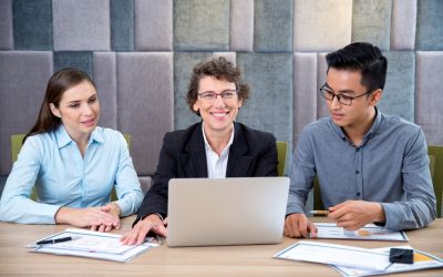 happy-female-leader-meeting-with-employees_1262-2129