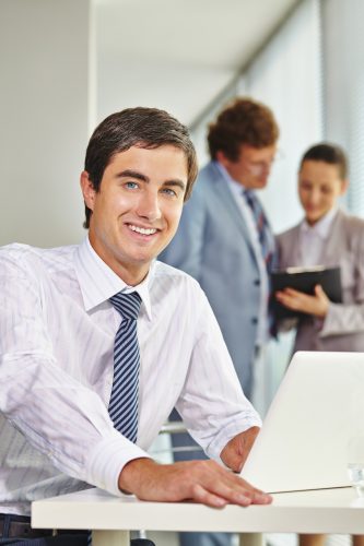 happy-male-executive-with-white-shirt_1098-781