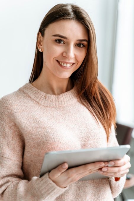 portrait-young-businesswoman-with-tablet_23-2148908886
