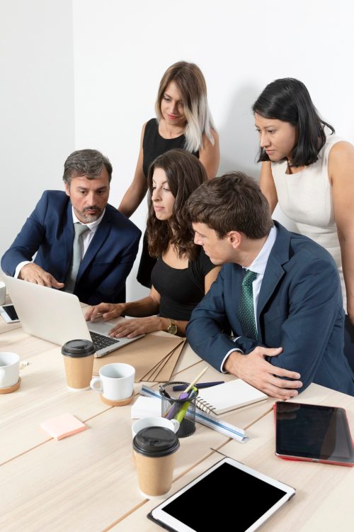 professional-employees-collaborating-medium-shot_23-2148352553
